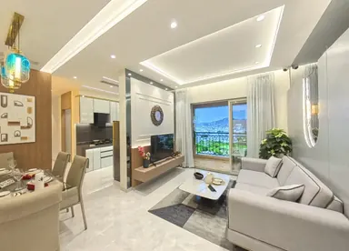 Living and dining room of the Cosmos Serenity sample flat